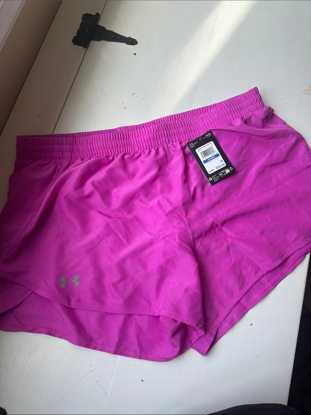 Under Armour Women’s Bright Pink Athletic Shorts